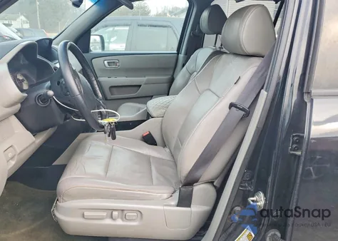 2014 Honda Pilot Touring z USA, uszkodzony, nr VIN 5FNYF4H92EB023140